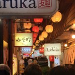 Alley full of packed ramen shops in Sapporo, Haruka was great